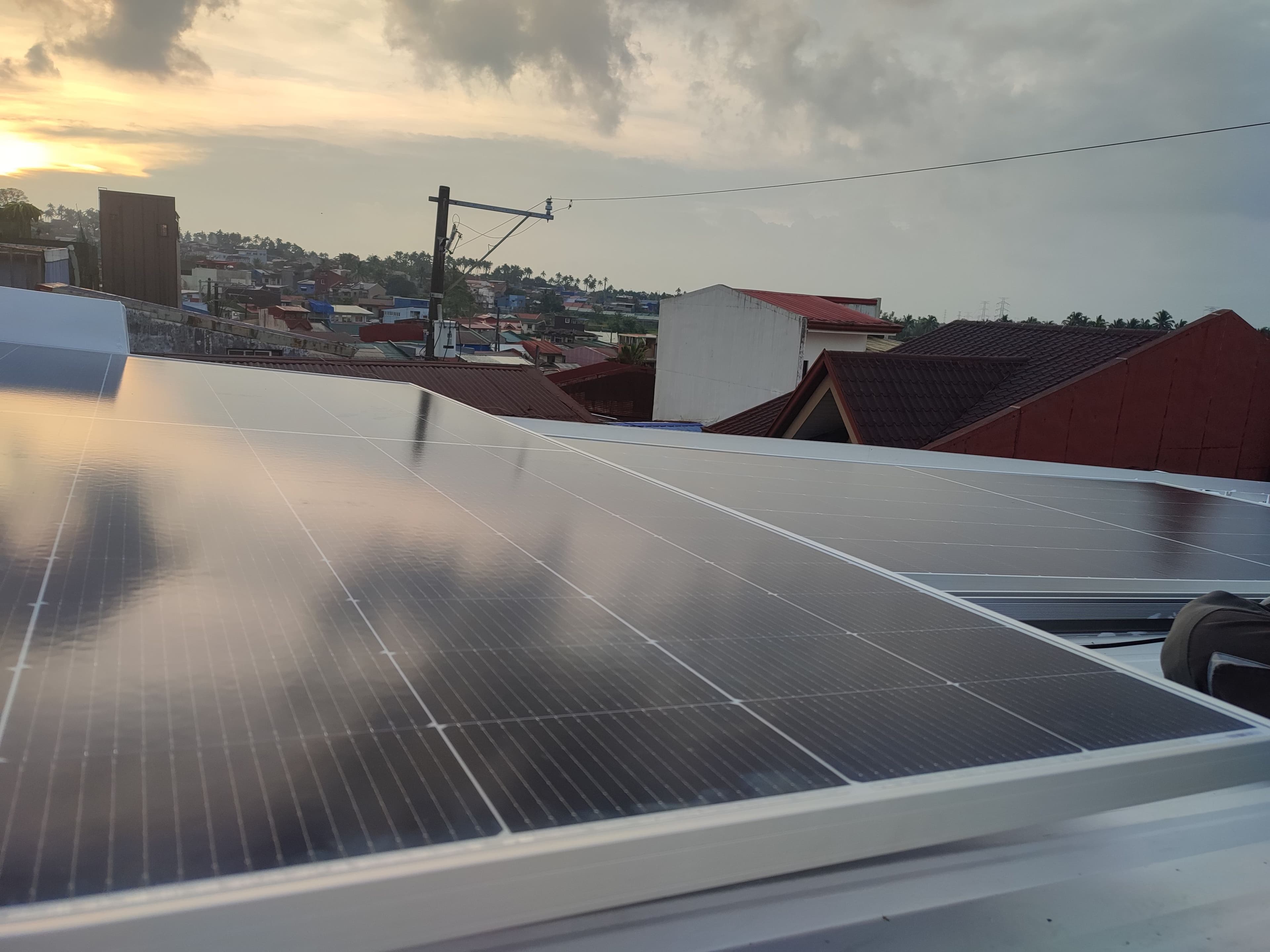 Solar panels on rooftop in the Philippines — Aibishter Solar Calculator